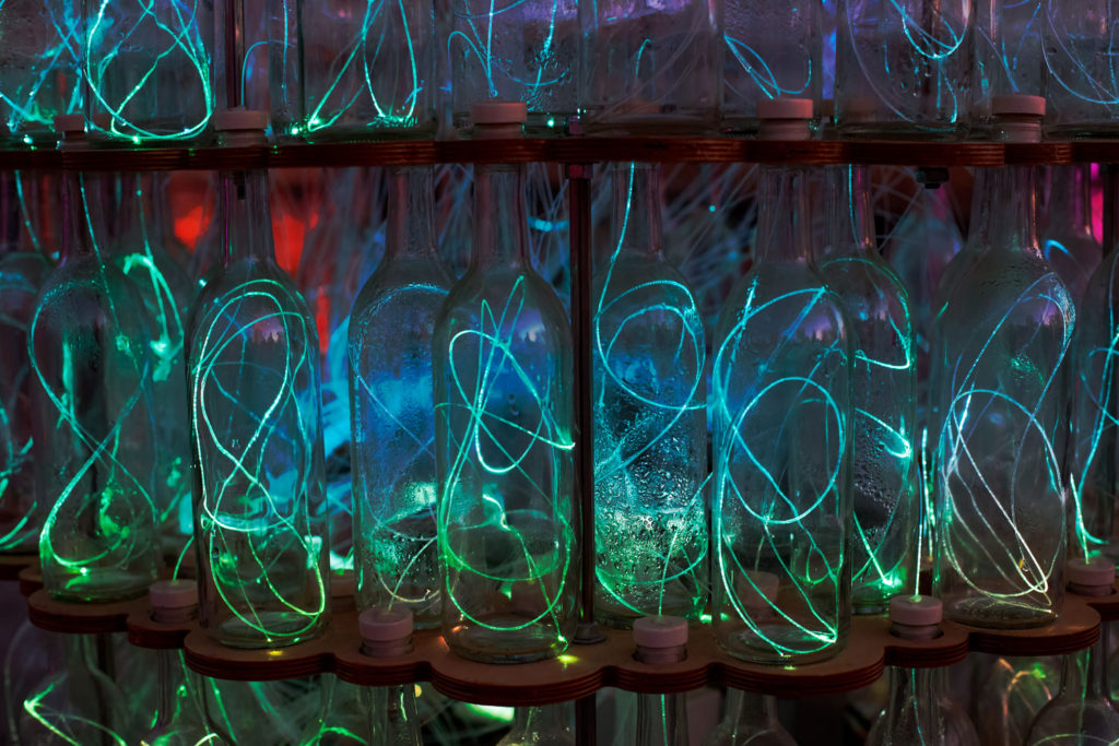 fiberoptic lights in wine bottles from Bruce Munro at sesnsorio in Paso Robles