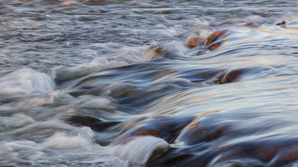 Flowing rapids long exposure, Kern River in hart Park, bakersfield