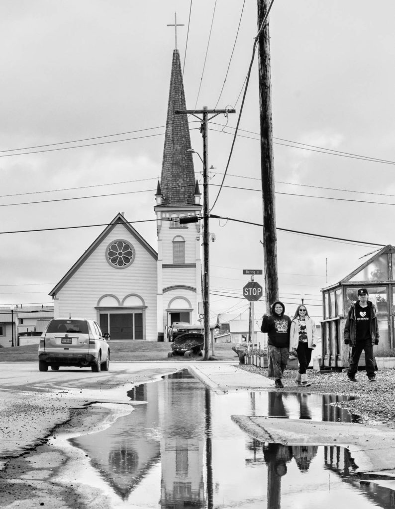 Nome kids and Nome church in street scene