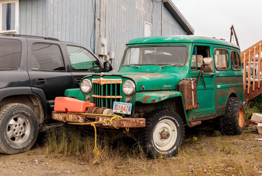Rustic antique green car in Nome, Alaksa